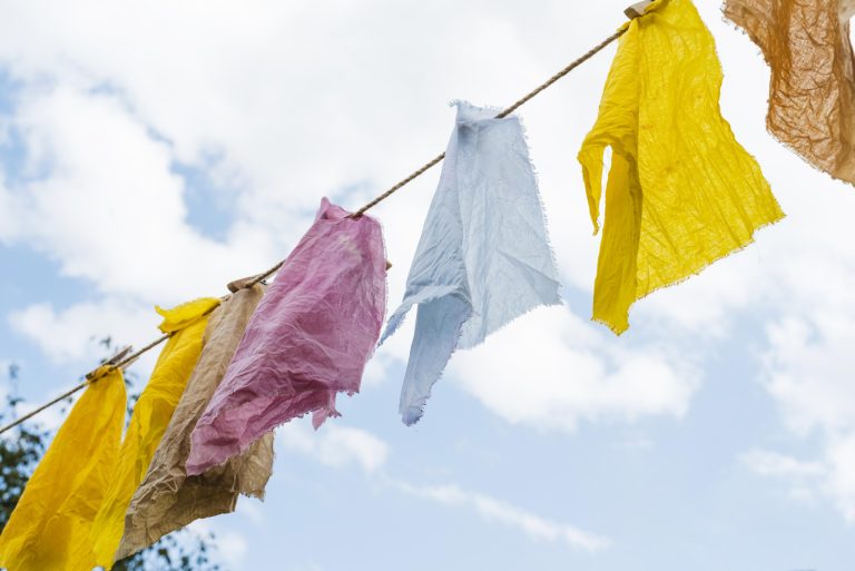 side-view-pigmented-cloths-held-by-pegs-assortment